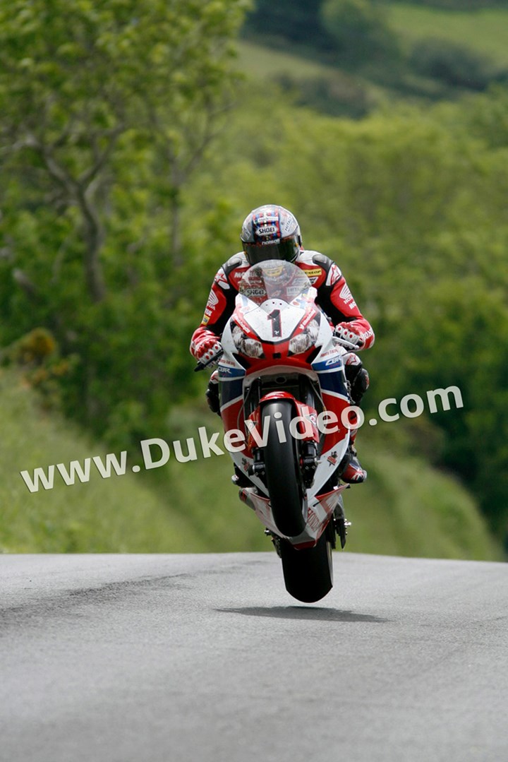 John McGuinness; Wheelie alone - click to enlarge